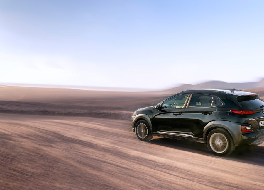 black suv on brown sand during daytime